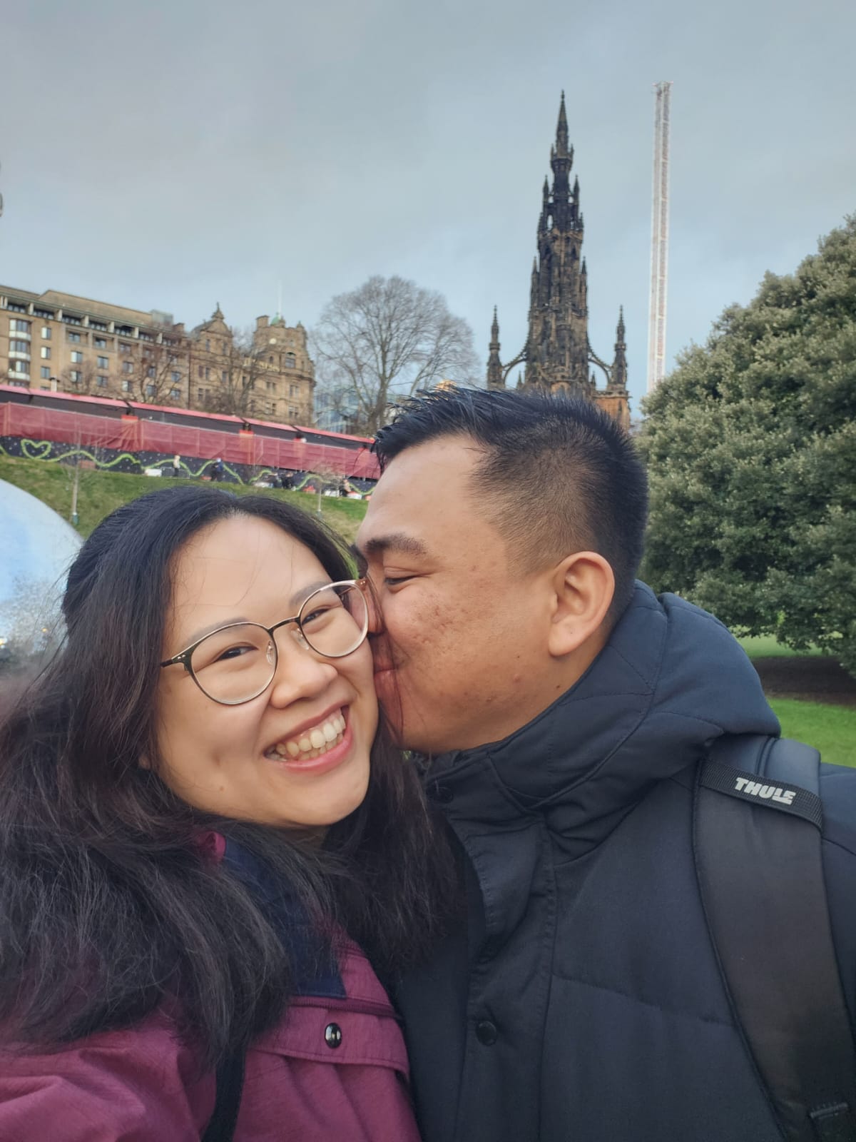 Daniel kisses Angelia on the cheek in Edinburgh.