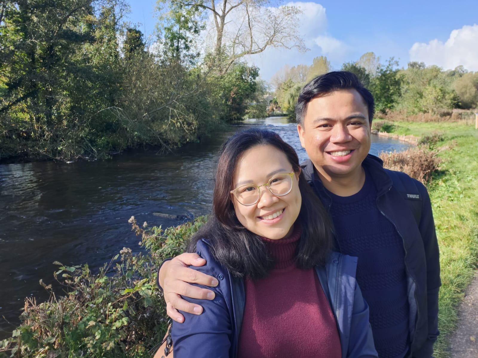 Angelia and Daniel by the water in the UK.